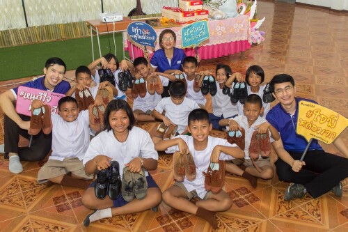 EDF-Foundation-team-with-students-and-new-new-shoes.jpeg